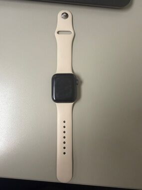 Apple Watch with Pink Sand Sport Band and Space Gray Case